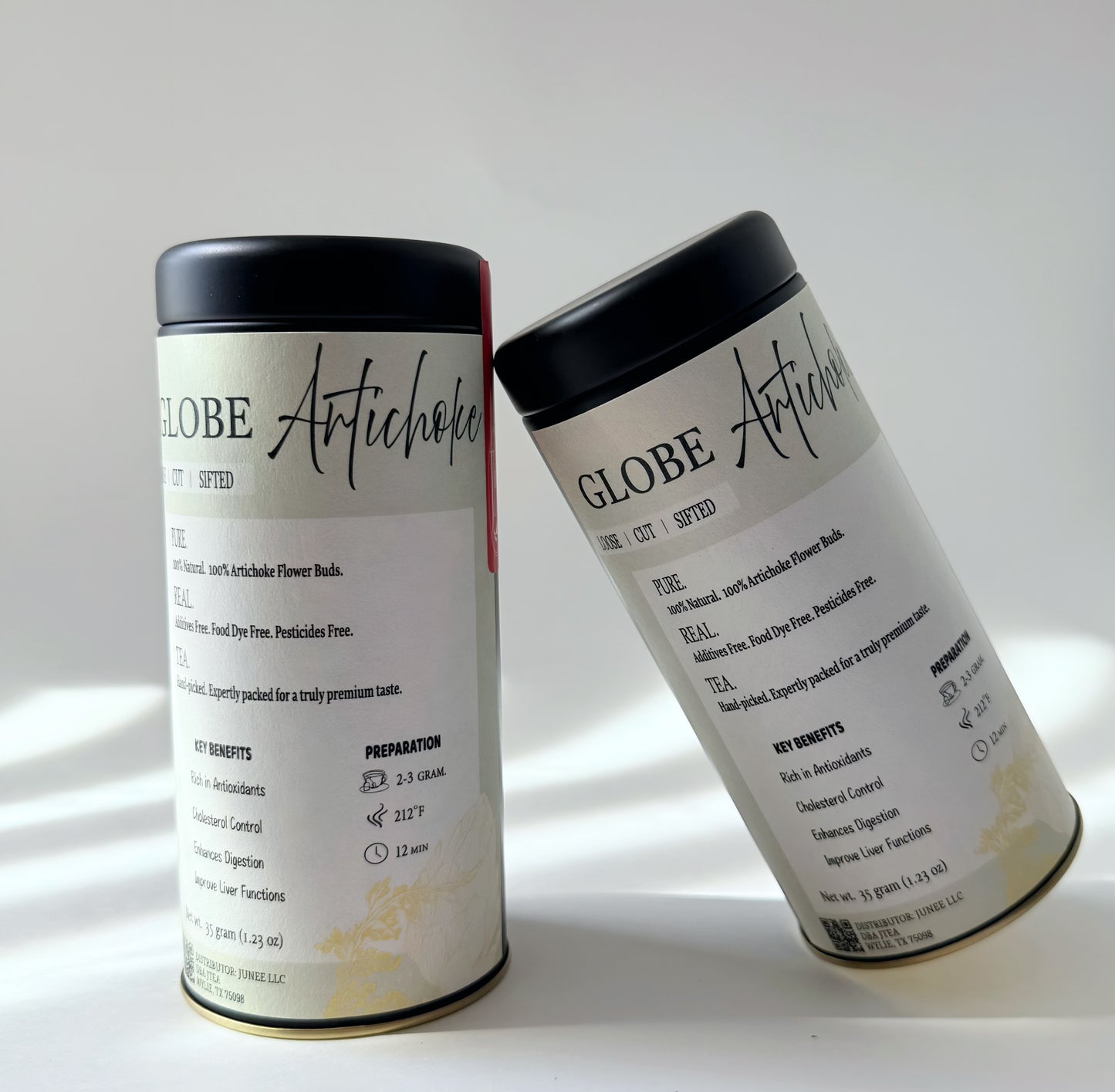 Two cylindrical containers labeled 'Globe Artichoke' on a white background