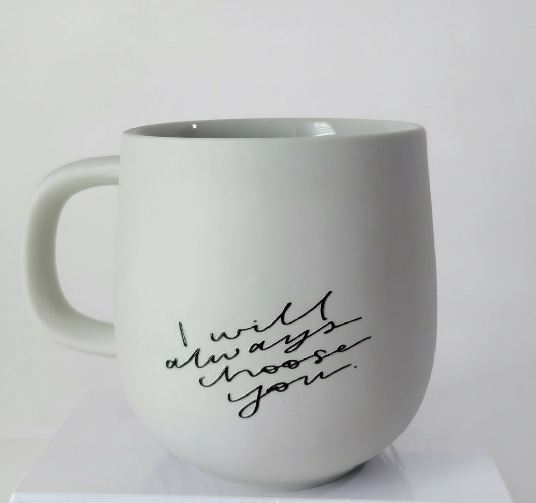 White mug with 'I will always choose you' text on a white background