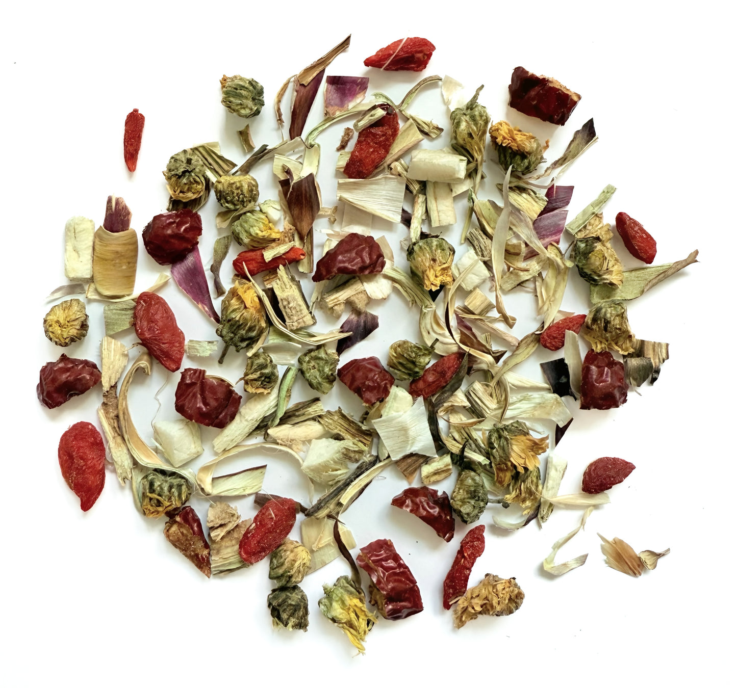 Assorted dried herbs and spices on a white background
