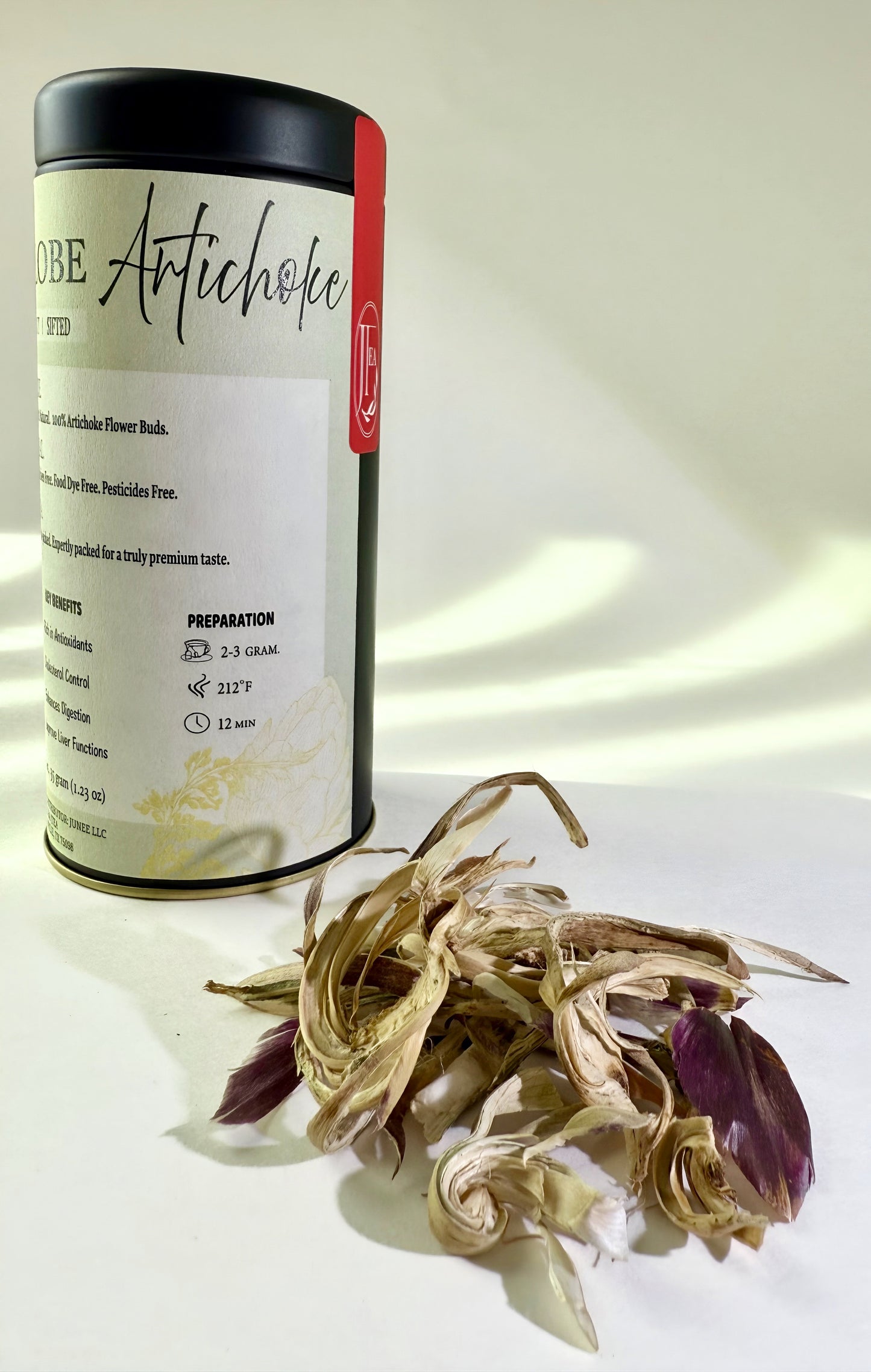 Artichoke product packaging with dried artichoke flowers on a white background