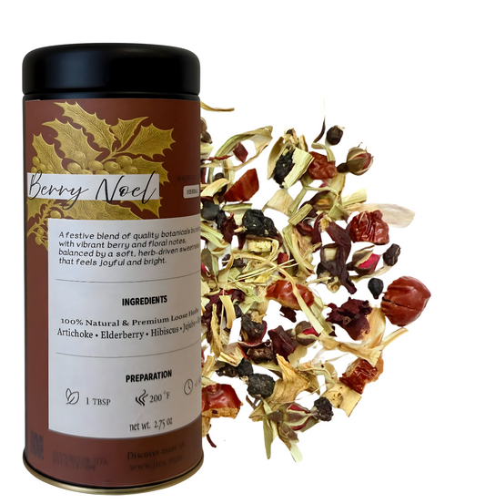 Tea canister labeled 'Berry Noel' with dried berries and leaves on a white background